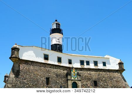 Farol Da Barra, Barra Lighthouse, In Salvador, Bahia, Brazil. The Historic Architecture Of Salvador 