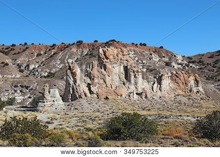 Eroded Rock Formations And Autumn Vegetation At Plaza Blanca Or The White Place, Of The Rio Negro Ba