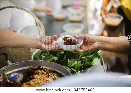 Hand Begging For Food From The Rich's Share : The Beggar Is Waiting For Food From Charity Aid : The 