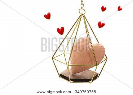 The Big Pink Heart Enter The Gold Cage Red Small Hearts Fly Upwind On White Background And Copy Spac