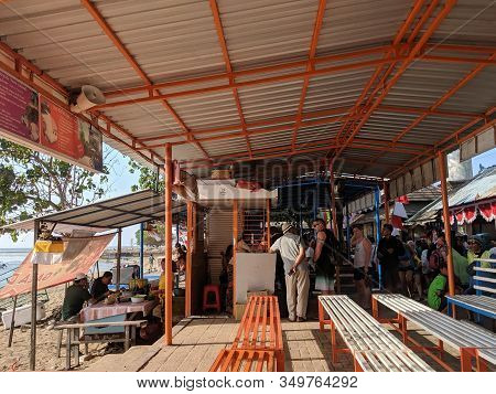 Sanur Denpasar, Indonesia - August 22, 2019: A Few Tourists Queuing At The Ticket Booth Of Speedboat