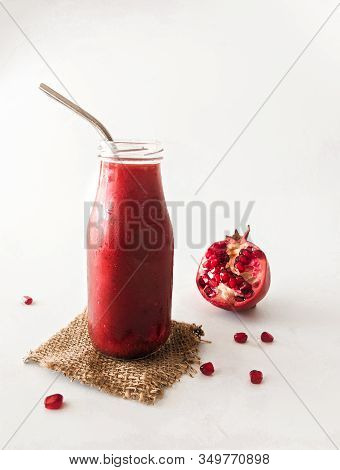 Pomegrenate Beetroot Pink Smoothie In A Mason Jar. Healthy, Natural, Organic Diet Food And Drink, We