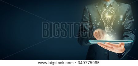 Creative Company Give You Their Creativity And Ideas. Hands With Digital Tablet And Graphics Light B