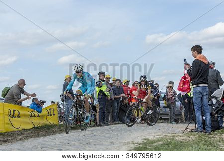 Gruson, France - April 12,2015: Daniil Fominykh Of Team Astana And Jay Robert Thomson Of Mtn-qhubeka