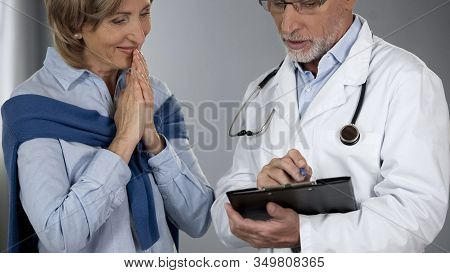 Senior Lady Happy To Hear Treatment Results, Doctor Telling Good News, Progress