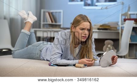 Teen Girl With Low Self Esteem Looking In Mirror, Beauty Complexes, Acceptance