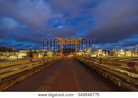 Japanese Torii Pole At Miyamae Bridge At Night In Takayama Old Town, Gifu, Urban City In Japan. Arch