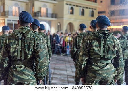 Easter Celebration Night Outside Agios Minas Cathedral. A Marching Band And Military Parade In The O