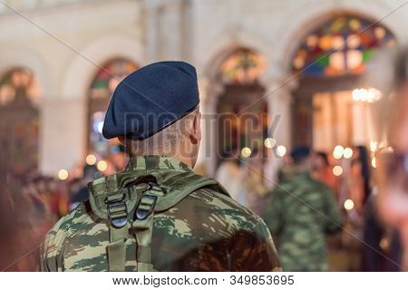 Military Young Man In The Easter Night During Church Service