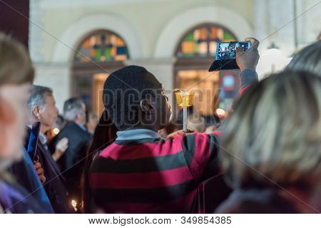 Heraklion, Crete, Greece - 28 April 2019: People Celebration With Lit Candles Easter Night Outside A