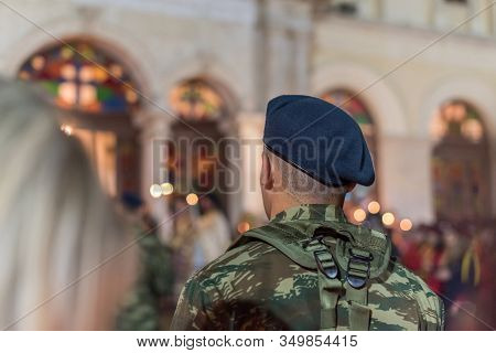 Military Young Man In The Easter Night During Church Service
