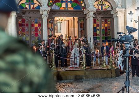 Heraklion, Crete, Greece - 28 April 2019: Easter Celebration Night Outside Agios Minas Cathedral. Сe