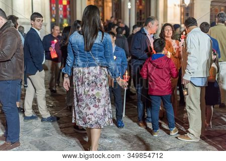 Heraklion, Crete, Greece - 28 April 2019: People Celebration With Lit Candles Easter Night Outside A