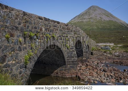 Th Old Bridge Of Sligachan, That Spans The Rocky Water Bed Of River Sligachan On The Isle Of Skye, S