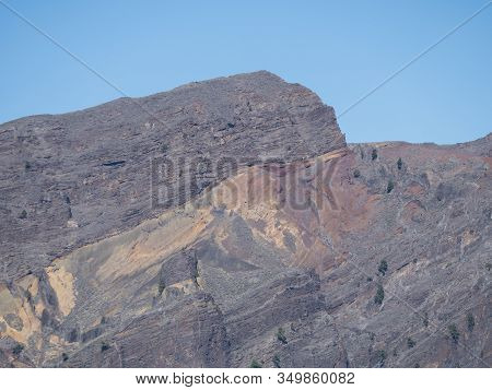 View On Colorful Vocanic Rock Of Crater Caldera De Taburiente With Mountain Peak Roque De Los Muchac