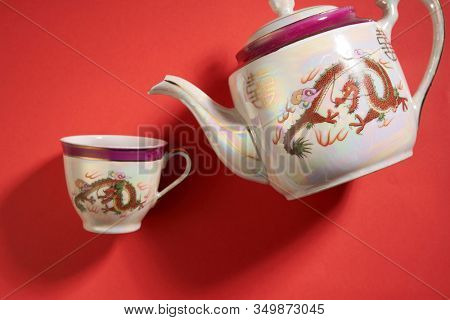 dragon and phoenix Teapot and cups used in traditional Chinese wedding ceremony with chinese sign meaning happinese. Translation: Double Happiness