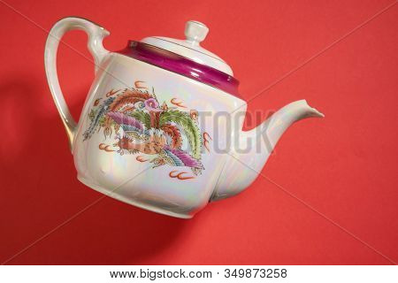 dragon and phoenix Teapot and cups used in traditional Chinese wedding ceremony with chinese sign meaning happinese. Translation: Double Happiness