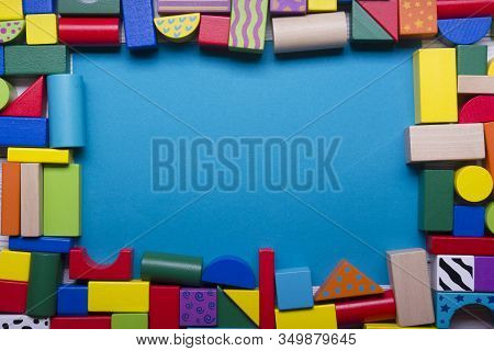 Kids Educational Developing Toys Frame On White Background. Top View. Flat Lay. Copy Space For Text