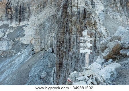 Trekking Direction Indicators. Tourist Paths Directions And Travel Time Shown On A Traditional Direc