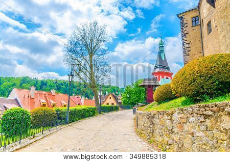 Cobblestone Path Road To Medieval Loket Castle (hrad Loket) Gothic Style Building With Stone Walls, 