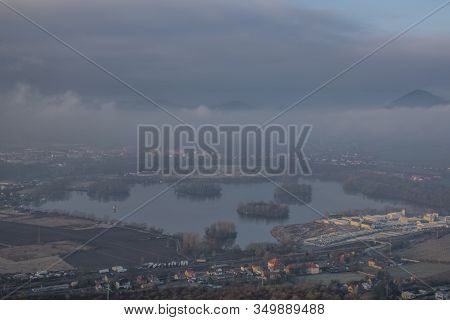Sunrise Time On Radobyl Hill Over Valley Of River Labe And Lovosice Town