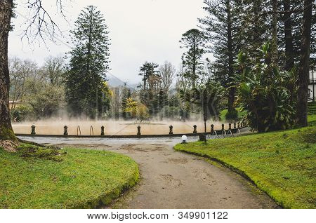 Furnas, Azores, Portugal - Jan 13, 2020: Hot Spring Iron Water Thermal Pool In Terra Nostra Garden. 