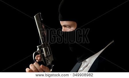Killer In Balaclava Holding Gun, Preparing For Armed Robbery, Bank Break In