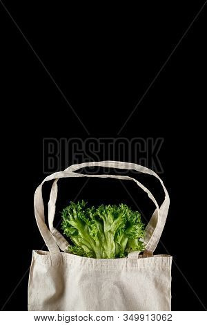 Zero Waste Use Less Plastic Concept. Fresh Vegetables Organic In Eco Cotton Fabric Bags On Black Bac