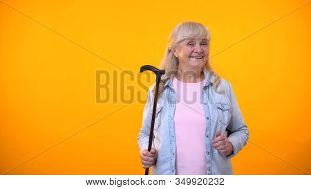 Senior Lady Holding Walking Stick, Disability Aids For Elderly, Healthcare