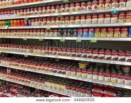Orlando, Fl/usa-2/6/20: The Campbells Soup Aisle At A Publix Grocery Store With A Variety Of Campbel