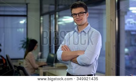 Young Company Manager Crossed Arms Smiling On Camera, Professional Office Worker