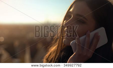 Beautiful Young Female Talking Phone On Skydeck Sharing Impressions, Roaming