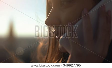 Pretty Smiling Lady Talking Cellphone With Friend Standing On Skydeck Connection