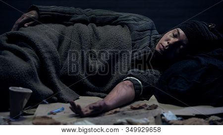 Drug Abused Homeless Person Lying Street After Taking Dose, Narcotic Addiction