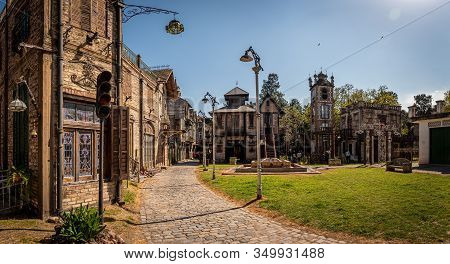 Gonzalez Catan, Argentina, September 28, 2019: Cobblestone Path Through Abandoned Buildings In The A
