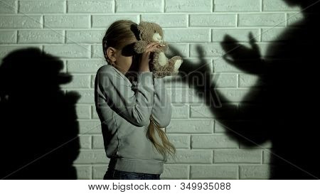 Scared Kid With Teddybear, Shadow Of Adult Screaming At Child, Domestic Violence