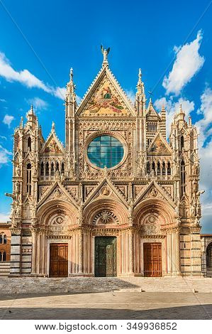 View Of The Facade Of The Gothic Cathedral Of Siena, Tuscany, Italy. Completed In 1348, The Church I