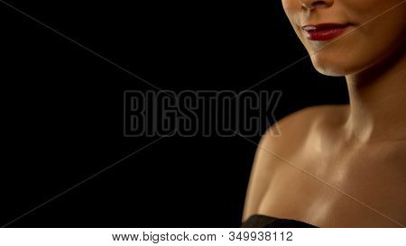 Smiling Elegant Woman Isolated On Black Background, Place For Text, Statistics