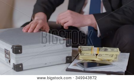 Entrepreneur Getting Money From Briefcase, Kickback For Secret Business Deal