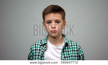 Scared Male Kid Standing Grey Background, Frightened Child, Orphanage Bullying