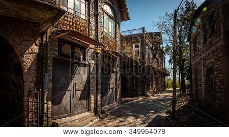 Gonzalez Catan, Argentina, September 28, 2019: Cobblestone Path Through Abandoned Buildings In The A