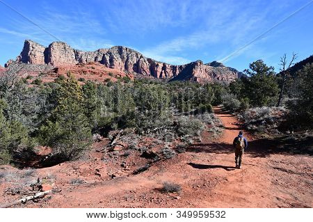 Sedona, Arizona - January 25, 2020 - Young Male Hiker On Hiking Trail In Red Rock Country Near Sedon