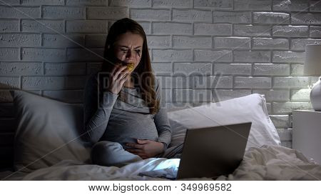 Extremely Emotional Pregnant Woman Crying, Eating Donuts, Watching Melodrama