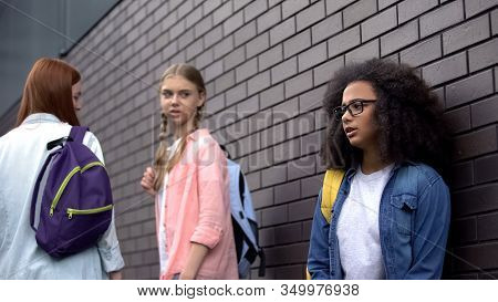Unkind Teenagers Insulting Black Female Student In Eyeglasses, Humiliation