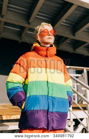  Androgyne Woman with red sunglesses outdors