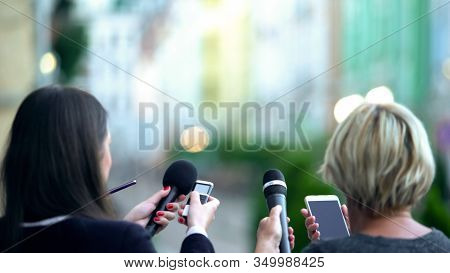 Journalists Waiting Superstar For Interview, Holding Microphones And Dictaphones