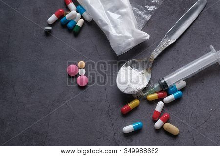 Top View Of Drug , Herein And Pill On Table, Drug Abuse
