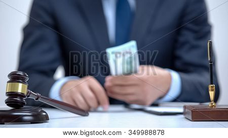 Corrupt Lawyer Holding Bribe Money In Hands, Falsified Business Agreement, Crime