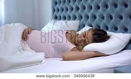 Pregnant Female Touching Painful Belly, Sleeping In Bed, Risk Of Miscarriage