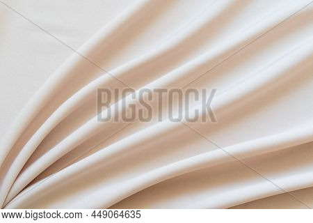 Abstract Beige Cloth Texture Background With Folds. Copy Space
